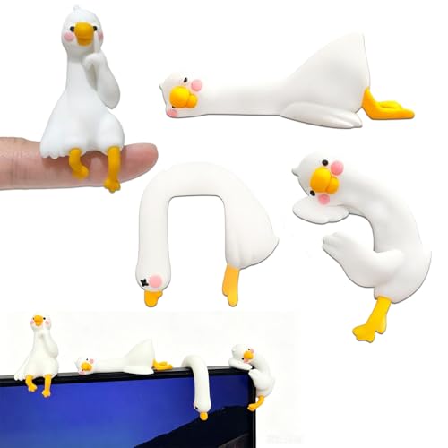 Four tiny resin geese in lazy, unbothered poses perched on your monitor — absurd, charming, and guaranteed to spark a coworker conversation.