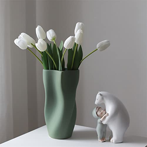 Vase en céramique pour fleurs séchées sur une table basse chic