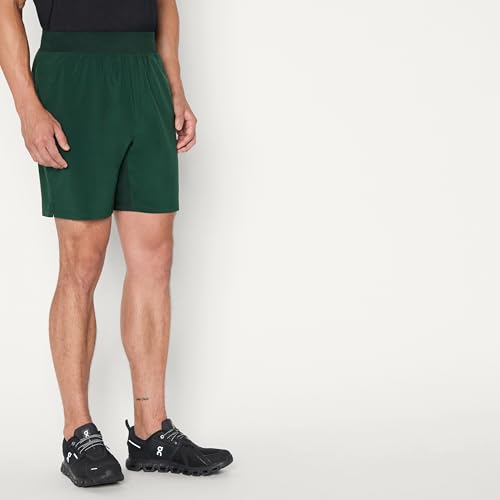 Image of Amazon Essentials Men's Athletic Running Training Shorts, Performance Stretch Woven Workout Shorts, 7 inch