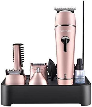 Kemei KM-1015 Grooming Kit on charging stand