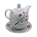 Tetera de porcelana, juego de té para uno Imagen de Tetera de porcelana, juego de té para uno