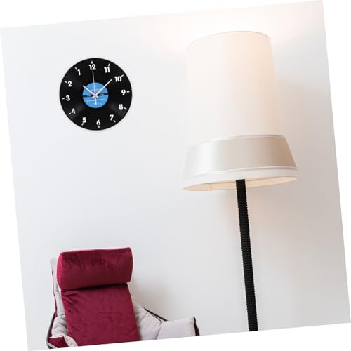 Mecanisme a rotation inverse pour cette horloge decorative d'exception