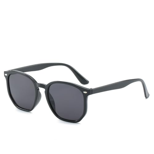 Lunettes de soleil de luxe aux finitions soignées et monture géométrique