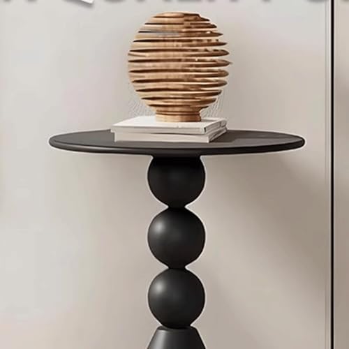 Table d'angle polyvalente ronde pour optimiser l'espace dans les studios et chambres