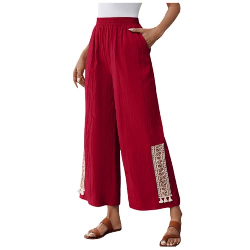 Pantalon d'été bohème raffiné avec broderies artisanales et finitions pompons soignées