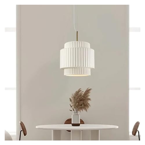 Lustre LED pour illuminer une table de salle à manger sombre avec style