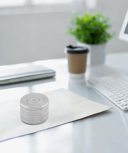 Image of ZAHEPA Geometric Flow Metal Paperweight for Office Table, Spinning Paper Weight, Stress Relief Gadget, Paper Holder, Office Desk Decor & Showpiece, Gift for Professionals & Students