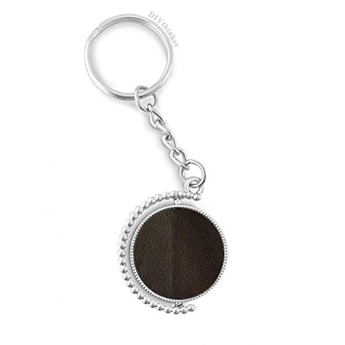 Llavero de cuero negro Pilgrim con diseño abstracto y anillo giratorio compacto