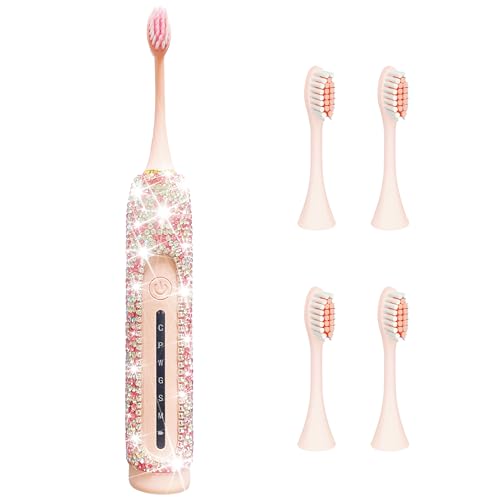 Brosse à dents électrique portable rose pour les essentiels de voyage des femmes actives