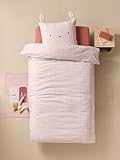 Système de soufflets sur les côtés pour maintenir l'enfant dans son lit et le garder bien couvert