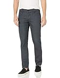 nudie thin finn dry heavy selvage Slim-fit jean in black selvage denim featuring five-pocket styling and decorative stitching at back pockets