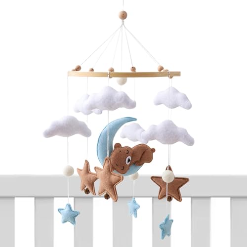 Ours suspendu berceau doux pour apaiser bébé au moment du change
