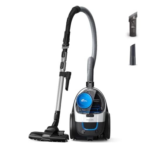 Philips beutelloser Staubsauger PowerPro Compact FC9332/09 (sehr niedriger Stromverbrauch bei hoher Leistung, 1,5 L Staubvolumen, integriertes Zubehör) weiß/schwarz