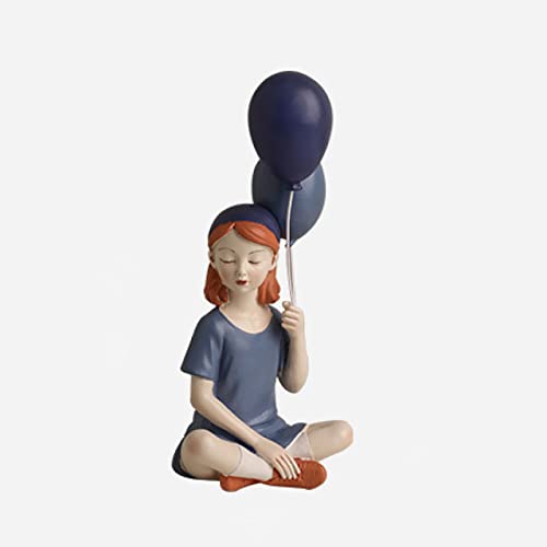 Statue fille à la boule décor de table basse pour salon moderne