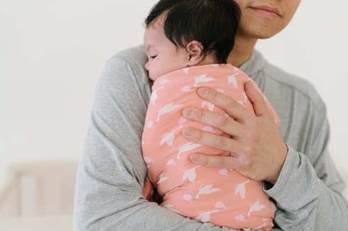 Image of KicKee Swaddling Blanket, Made from Luxuriously Soft KicKee Signature Blend Fabric, Buttery Softness for Snuggling Your Baby (Blush Stork - One Size)