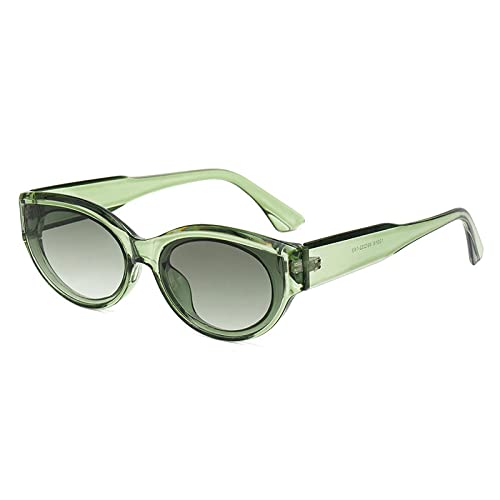 Lunettes de soleil ovales rétro vert pour un look de défilé urbain au quotidien