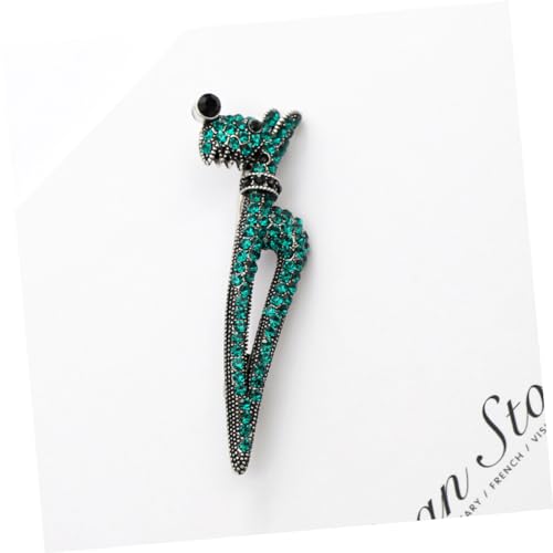 Broche vintage de ropa para renovar suéteres aburridos y fijar abrigos con estilo 7