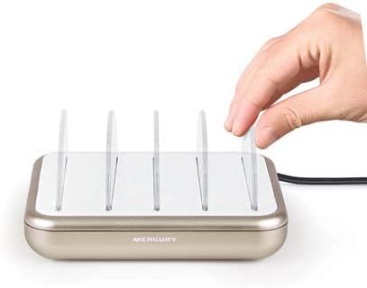 Hand inserting a translucent divider into the charging station