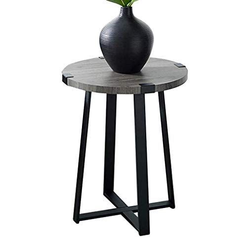 Table basse ronde en bois gain de place pour optimiser les petits salons