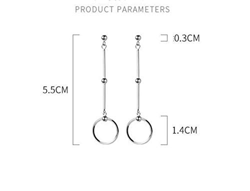 Pendientes largos de moda femenina para estilizar el rostro con dulzura 6