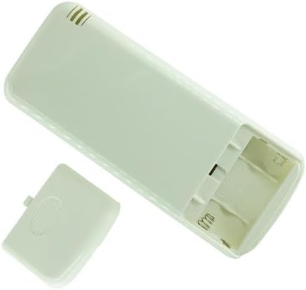 Back of the remote control with battery cover removed, showing empty battery slots from an angle.