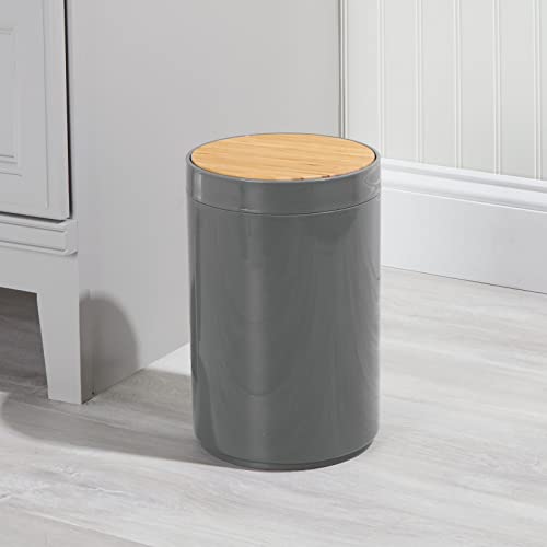 Image of mDesign Plastic Round Trash Can Small Wastebasket - Garbage Bin Container with Swing-Close Lid - Bathroom Garbage Basket - Holds Waste, Recycling - 1.3 Gallon - Basa Collection - Charcoal Gray /Natural