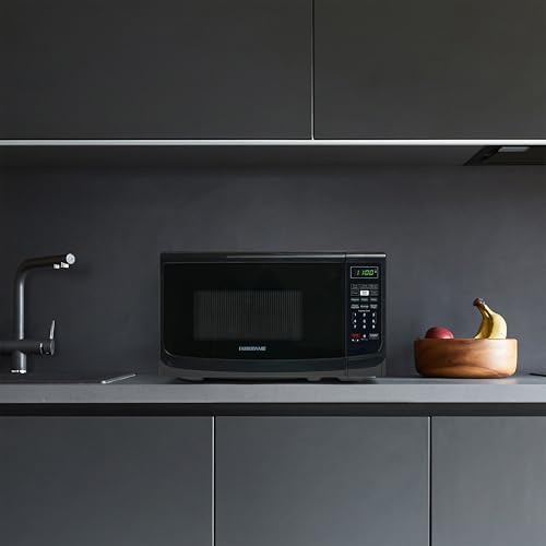 Farberware 0.7 Cu. Ft. Countertop Microwave Oven – 700 Watts Power, Auto Cook Settings, Defrost, Easy Clean and Child Safety Lock - Black - image 7