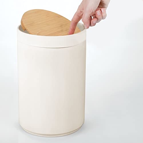 Image of mDesign Plastic Round Trash Can Small Wastebasket - Garbage Bin Container with Swing-Close Lid - Bathroom Garbage Basket - Holds Waste, Recycling - 1.3 Gallon - Basa Collection - Cream /Beige /Natural