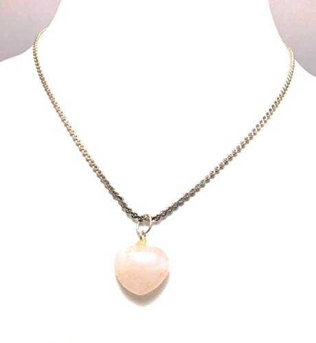 Quartz rose précieux et cristal vert transparent taillé en cœur