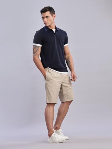 Image of Tommy Hilfiger Mens Blue Solid Polo Shirt
