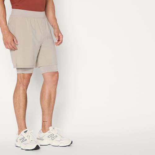 Image of Amazon Essentials Men's Athletic Running Training Shorts, Performance Stretch Woven Workout Shorts, 7 inch