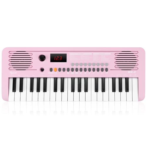 POGOLAB Piano Numérique 37 Touches, Mini Clavier Piano avec 40 Chansons, 200 Sons, 200 Rythmes, Midi, Keyboard Piano Électrique Portable pour Enfant Débutant(19,3 x 7,3 x 1,9 pouces) (Rose) - Les Beatles, Paul McCartney, John Lennon, RIngo Starr, George Harrison POGOLAB Piano Numérique 37 Touches, Mini Clavier Piano avec 40 Chansons, 200 Sons, 200 Rythmes, Midi, Keyboard Piano Électrique Portable pour Enfant Débutant(19,3 x 7,3 x 1,9 pouces) (Rose)