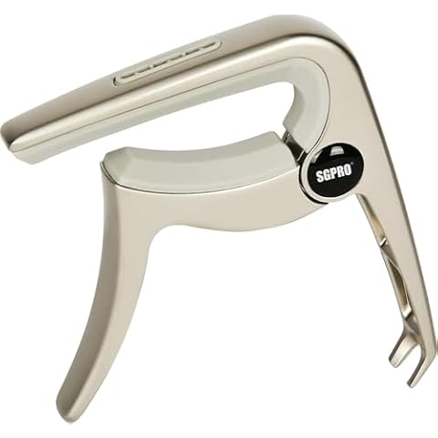 Guitar Capo 3-in-1: Acoustic & Electric Capo, Guitar Pin Puller, Pick Holder - Hidden Spring Design, Trapezoid Silicone Rubber Pad, Superior Zinc Alloy (Champagne) Cover
