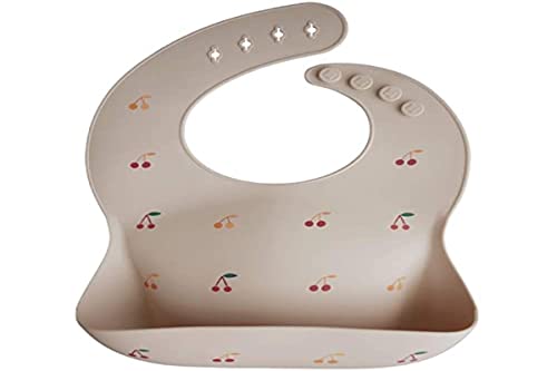 Image of mushie Silicone Baby Bib | Adjustable Fit Waterproof Bibs (Cherries)