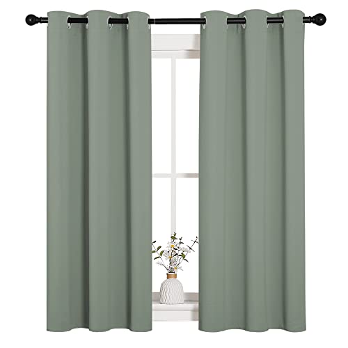 Image of NICETOWN Window Curtain Panels, Thermal Insulated Solid Grommet Blackout Draperies /Drapes for Basement (Sage Green, 1 Pair, 34 by 54-inch)