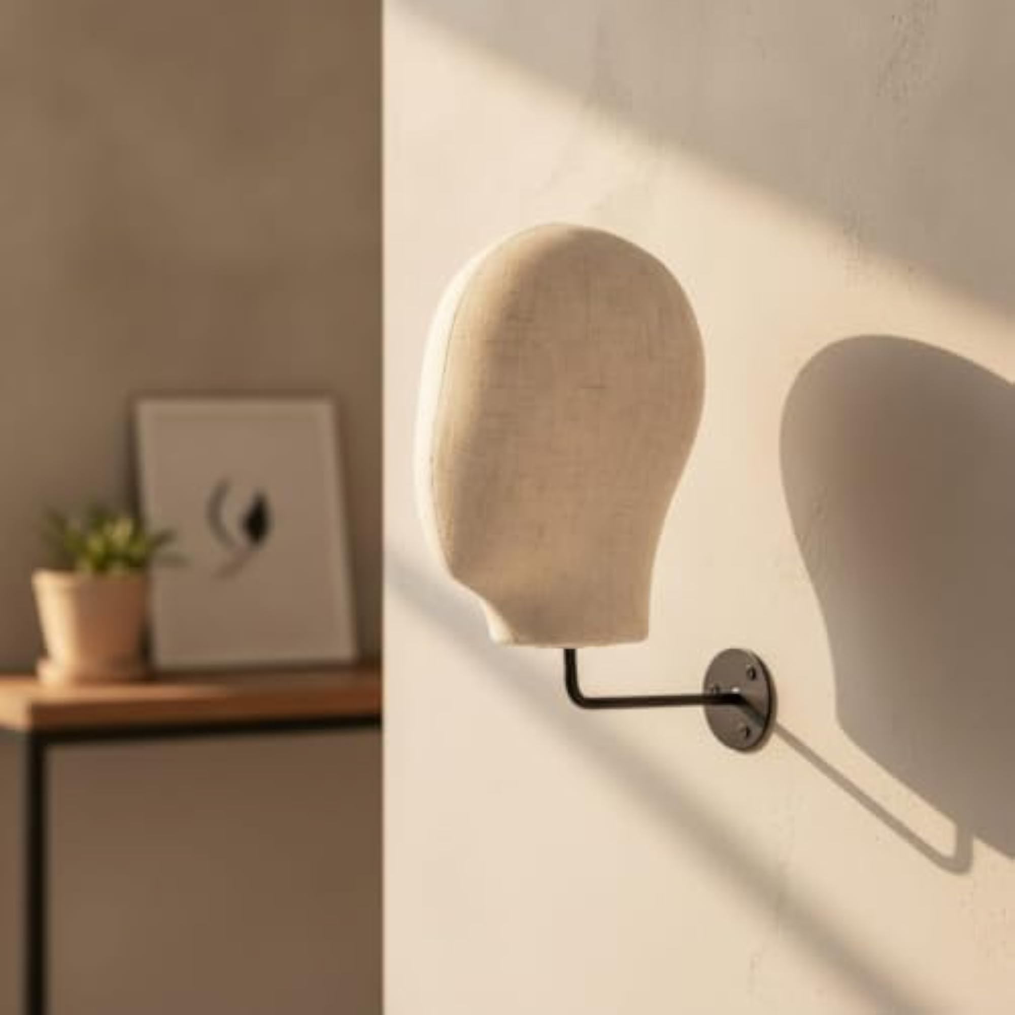 Textile-Covered Wall-Mounted Head Display for Hairpieces
