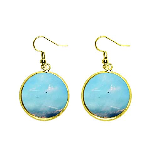 Pendientes de ave blanca de gota dorados perfectos para tus eventos de día