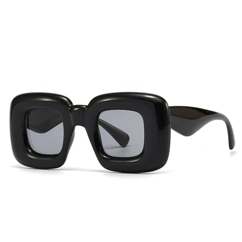 Lunettes de soleil tendance en version noire avec branches légères et ergonomiques