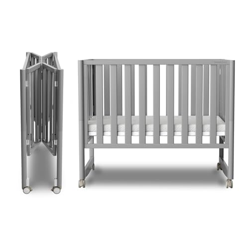 Image of MAMAZING EvoNook 7-in-1 Convertible Mini Crib - Easy Assembly, Portable Folding Baby Mini Crib with Wheels, 100% New Zealand Pinewood, 4 Adjustable Mattress Heights (Crib, Pebble Grey)