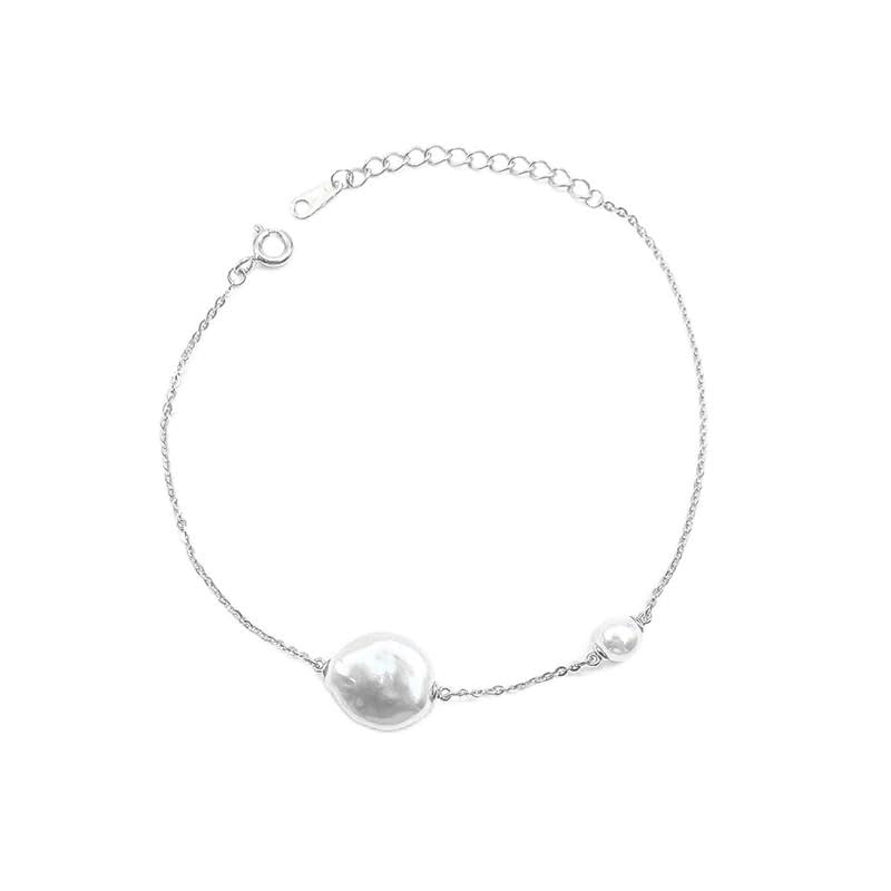 Bague perles or 14k : double perle naturelle au design élégant et raffiné pour femme