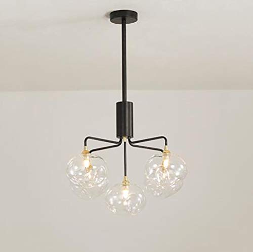 Chandelier bronze DNA pour éclairer un grand salon sombre