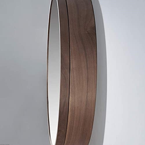 Miroir de salle de bain rond éclairé pour optimiser l'espace