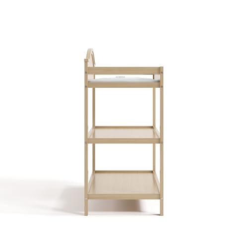 Image of Graco Story Changing Table with Water-Resistant Pad - GREENGUARD Gold Certified Baby Changing Station with Safety Strap, 2 Open Shelves, and a Nursery Must-Have Design (Driftwood)