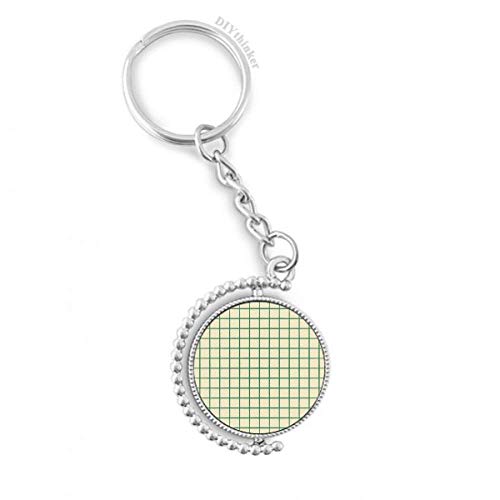 Llavero giratorio con patrón de rejilla blanco y verde con diseño decorativo de Pilgrim