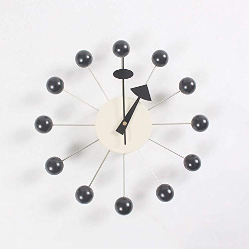 Horloge murale en bois massif et métal élégant pour un design épuré