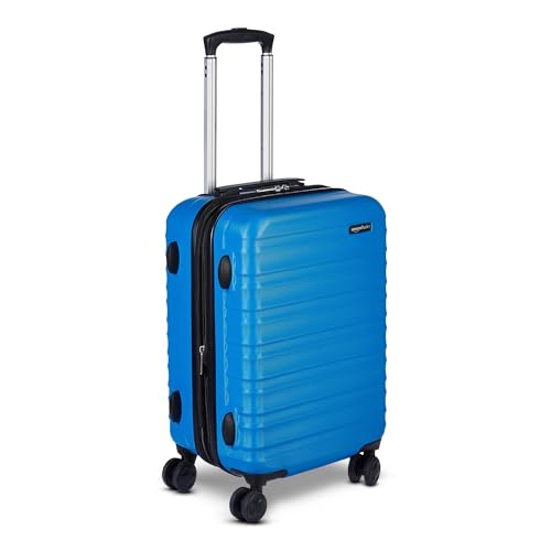 Amazon Basics Mała Walizka Twarda - Rozszerzalny Bagaż Podręczny ABS z 4 Podwójnymi Kółkami Obrotowymi - Odporna na Zarysowania i Lekka - 55 x 37,5 x 25,5cm - Jasnoniebieski