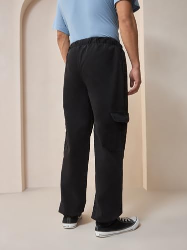 Image of Bewakoof Men's 100% Cotton Oversized Fit Joggers | Track pants for man | Lower for man | Trouser for men | Baggy trackpants for men | Multipurpose | Mens Lower Activewear | Utility Pockets | Lightweight & Flexible Elastic Waist | Casual Joggers | Loose Fit