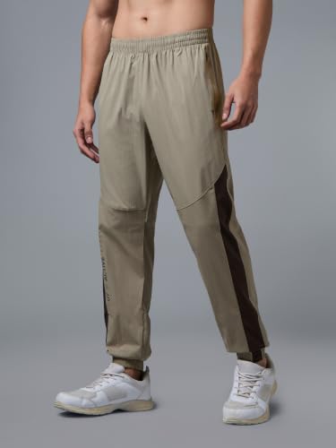 Image of TECHNOSPORT Men's Regular Fit Joggers with Zip Pockets, TECHNOLITE Quick Dry Stretchable Lightweight Track Pants for Gym Running and Casual Wear