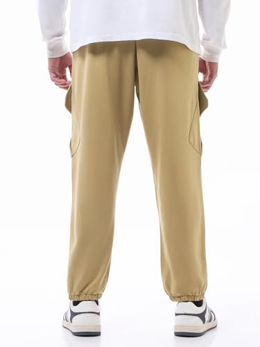 Image of Bewakoof Men's Cotton Super Loose Fit Joggers|Bewakoof Air 1.0 | Track pants for man | Lower for man | Trouser for men | Baggy trackpants for men | Multipurpose | Mens Lower Activewear | Utility Pockets | Lightweight & Flexible Elastic Waist | Casual Joggers | Loose Fit