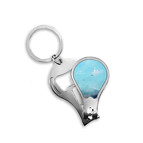 Coupe-ongles oiseau blanc ciel idéal pour trousse de voyage